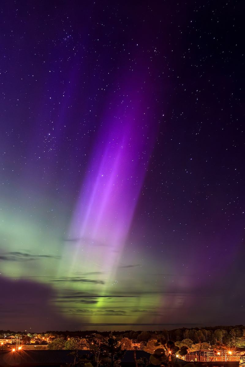Multicolored aurora pillar over Brastad, Sweden
